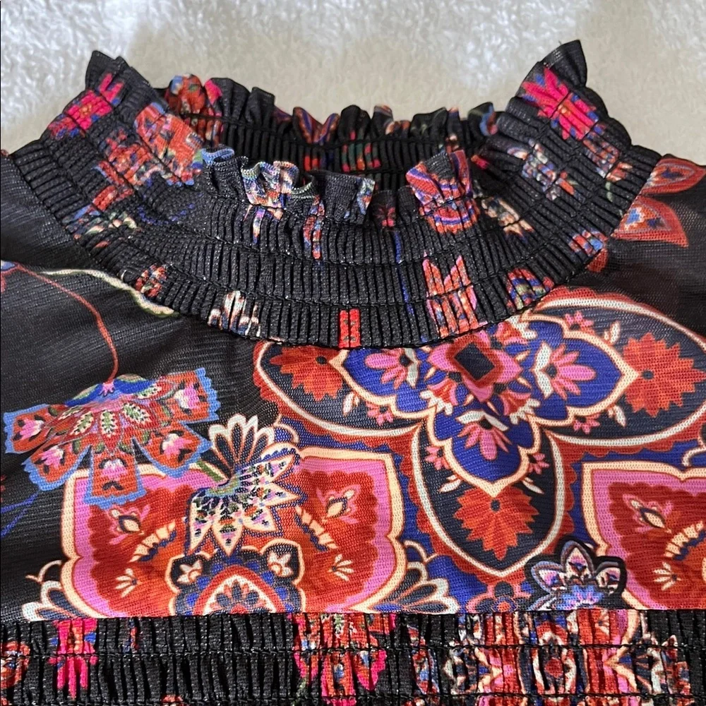 Chelsea & Violet Black Floral Smocked Peplum Blouse